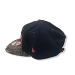 NEW ERA CLEVELAND CAVALIERS 9FIFTY TRICKED TRIM SNAPBACK